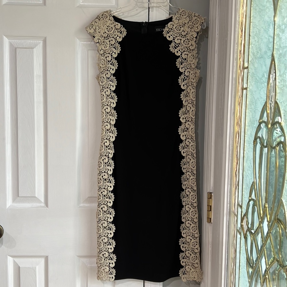 Women’s black and gold dress